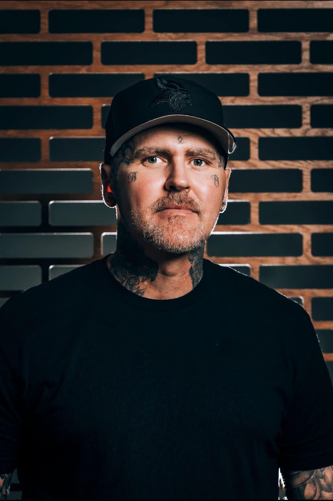 Burke Long, black-and-grey realism tattoo artist in Virginia Beach
